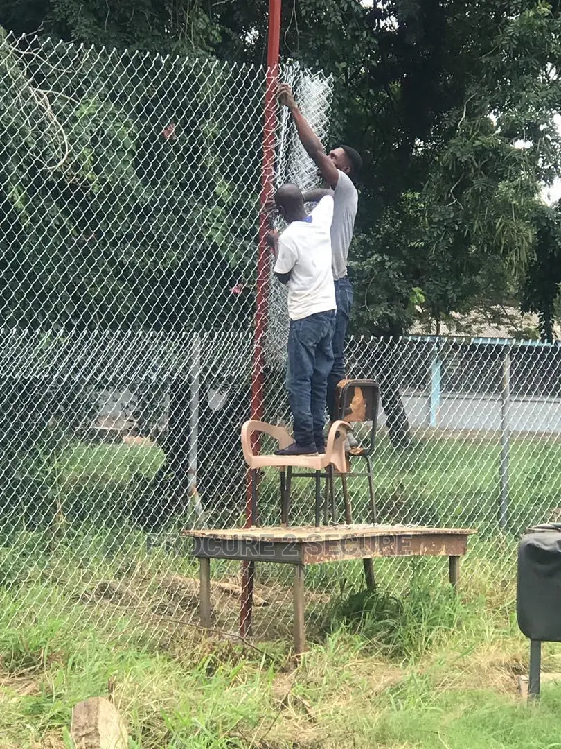 Chainlink Fence, Razor and Barbed Wire Installation
