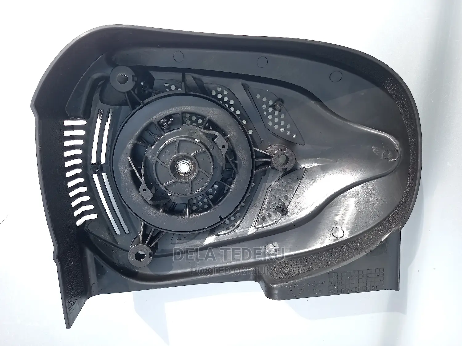 Lawn Mower Engine Starter/ at Caprice Bus Stop