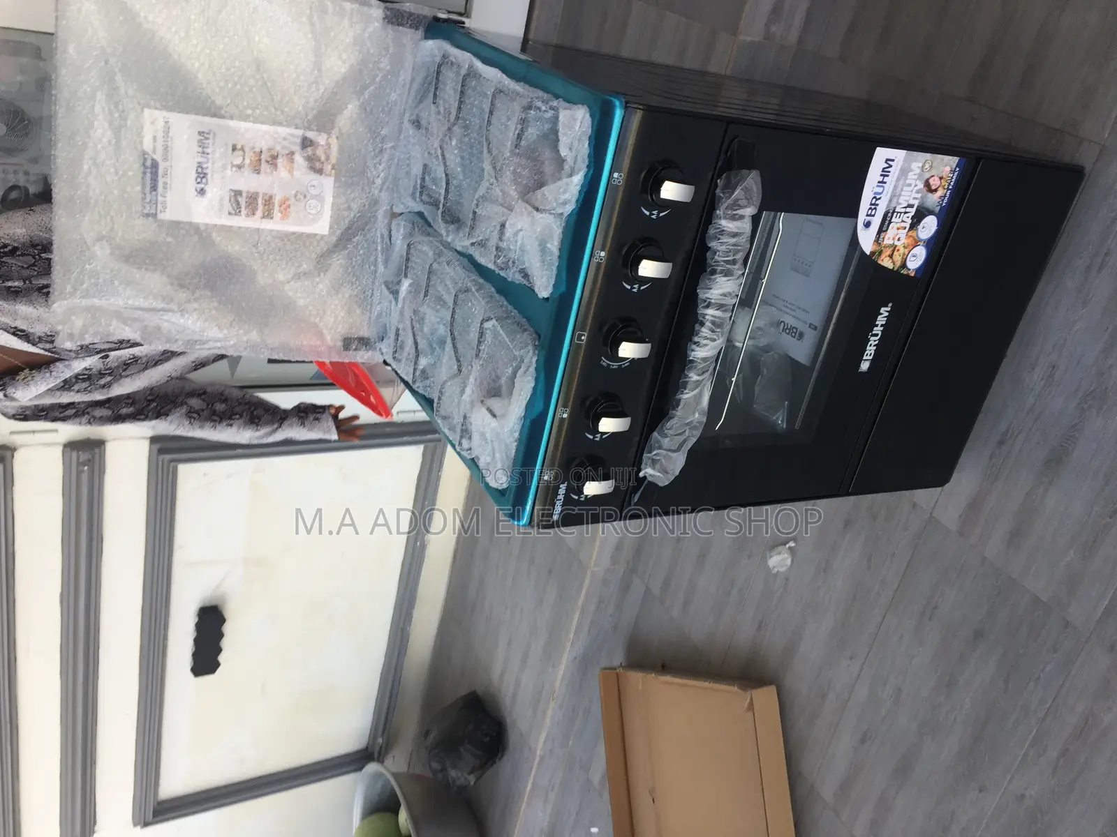 Black Bruhm 4 Burner Gas Cooker With Oven N Grill (BGC-5540)