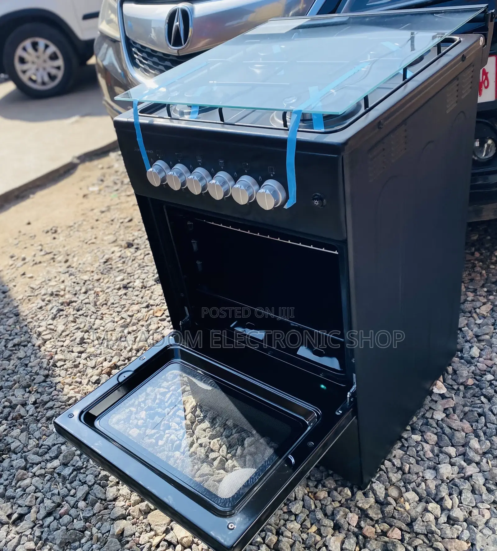 Elegant Black Volcano 50x50 4 Gas Burner With Oven Grill 