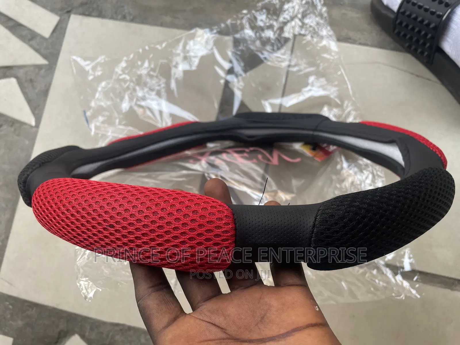Red and Black Steering Wheel Coat