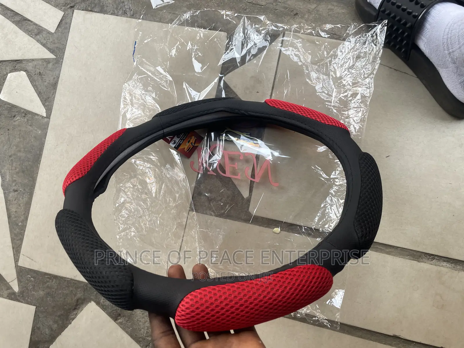 Red and Black Steering Wheel Coat