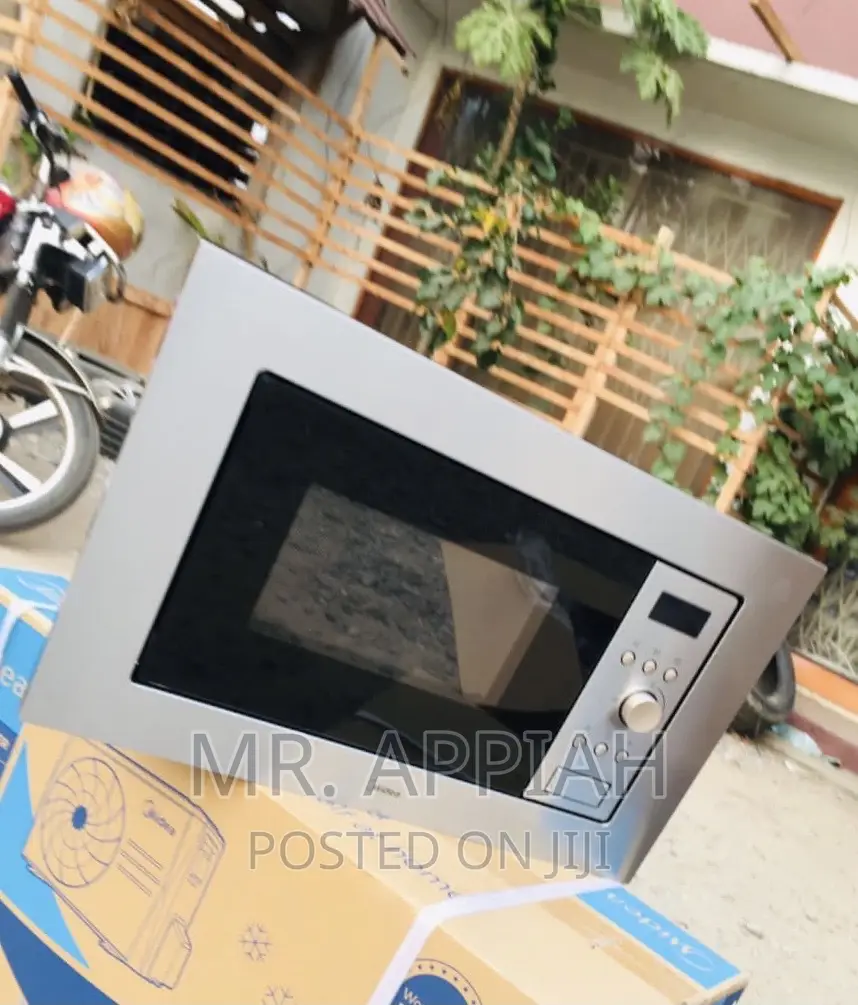 Authentic Midea AM717B57 Electric Microwave Oven.
