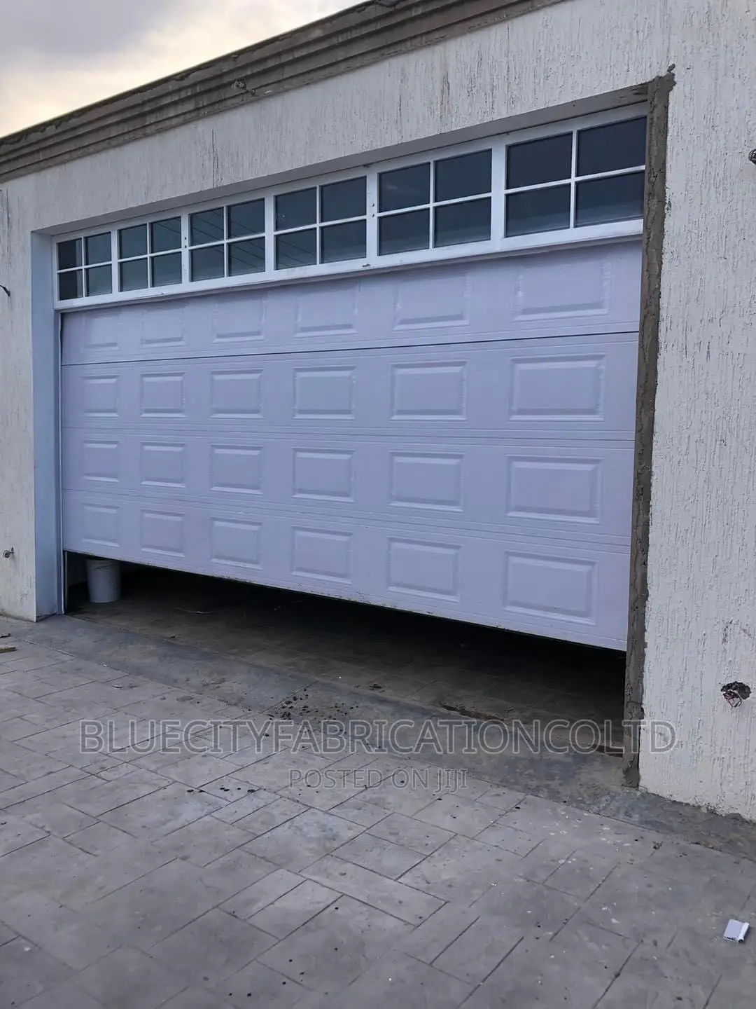 American Automated Garage Door and Fanlight on Top 16ft X8ft