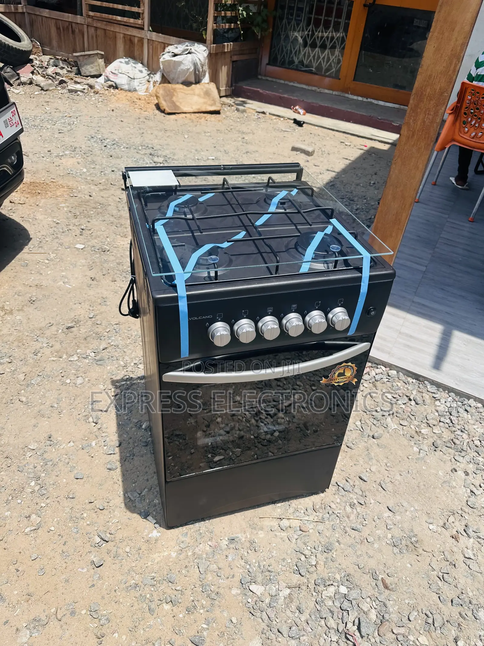 Neatly Sealed Black Volcano 4burner 50/50 Oven Grill