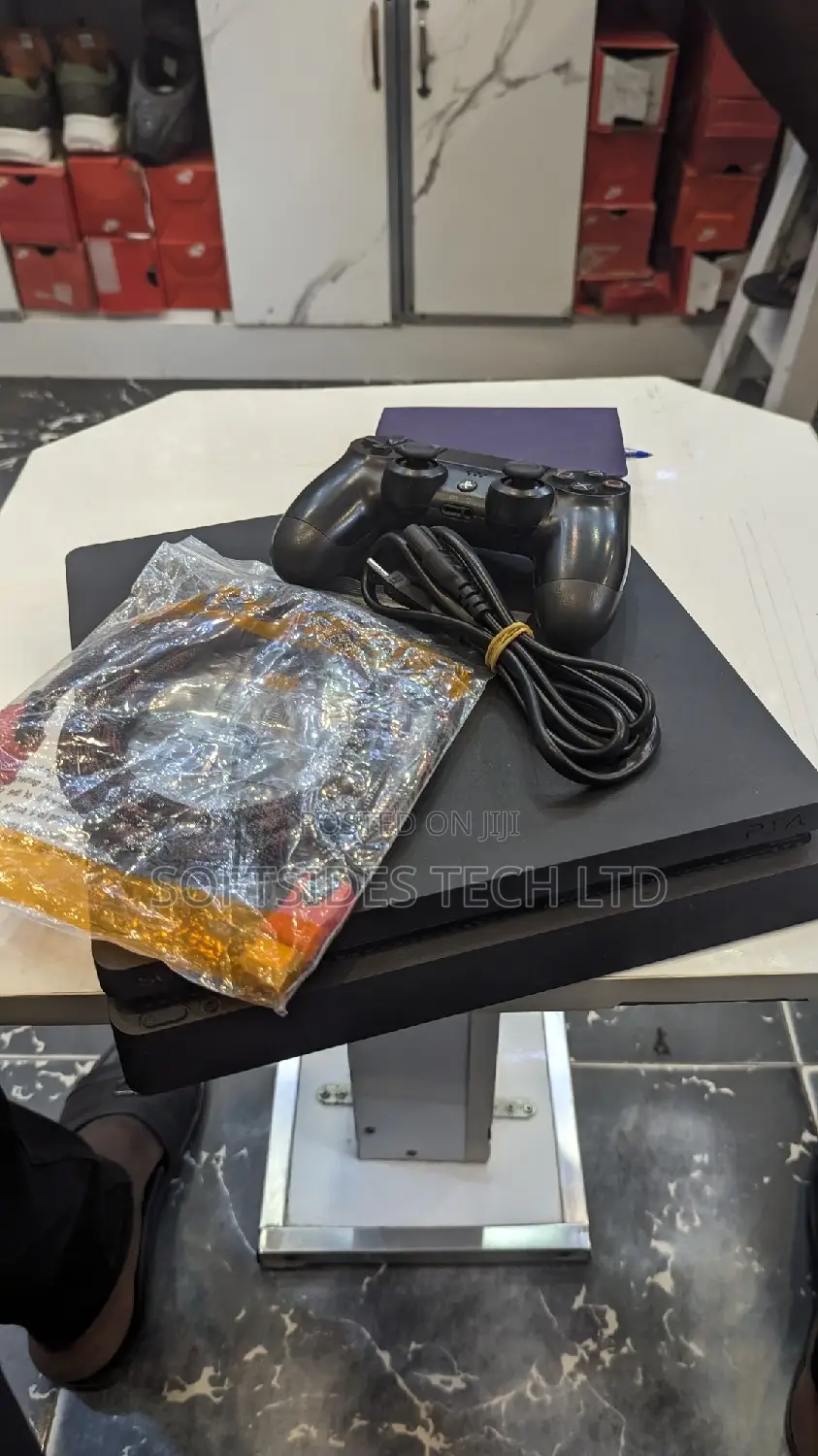 Uk Used Playstation 4 Slim With 8 Games at a Cheap Price