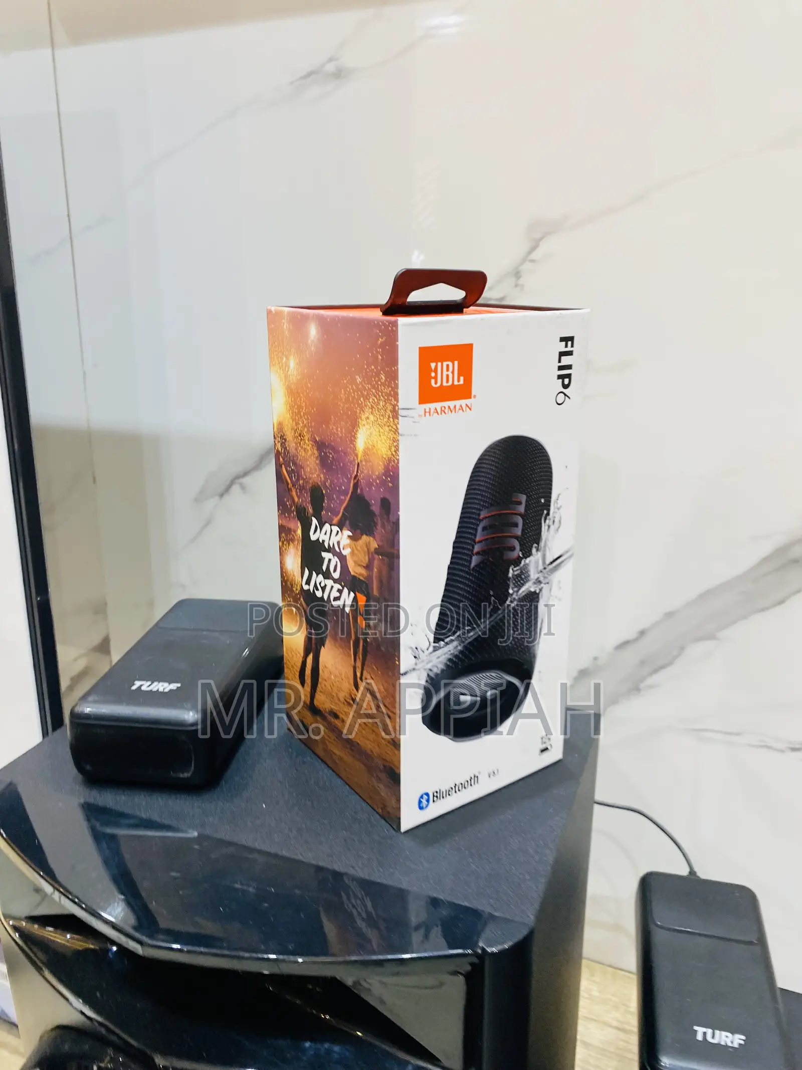 Elegant Black JBL Flip 6 Waterproof Bluetooth Speaker.