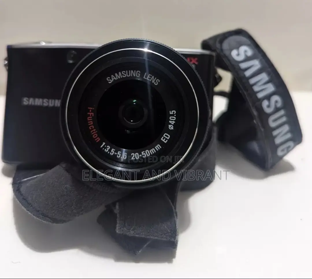 Samsung Nx100 Camera With 20-50mm Lens+ Pentacon 2.8 135mm