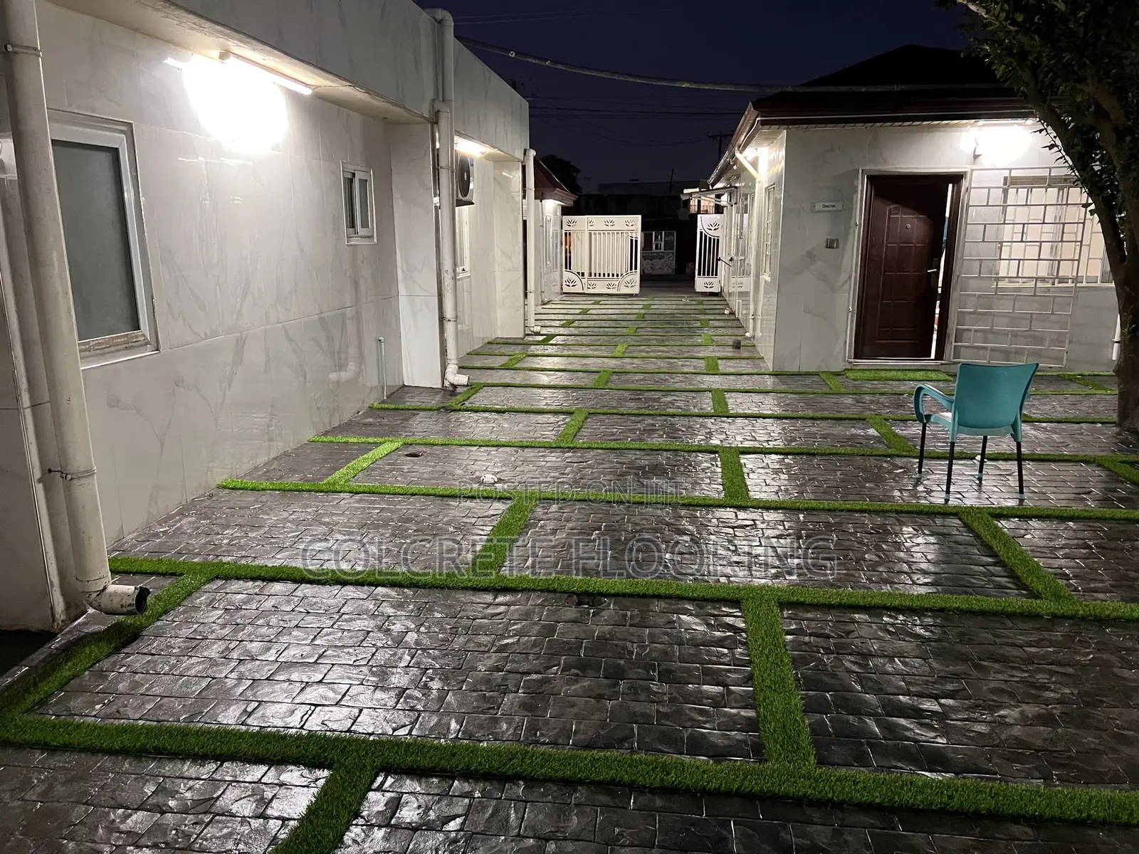 Cobbles Stamped Concrete With Astroturf