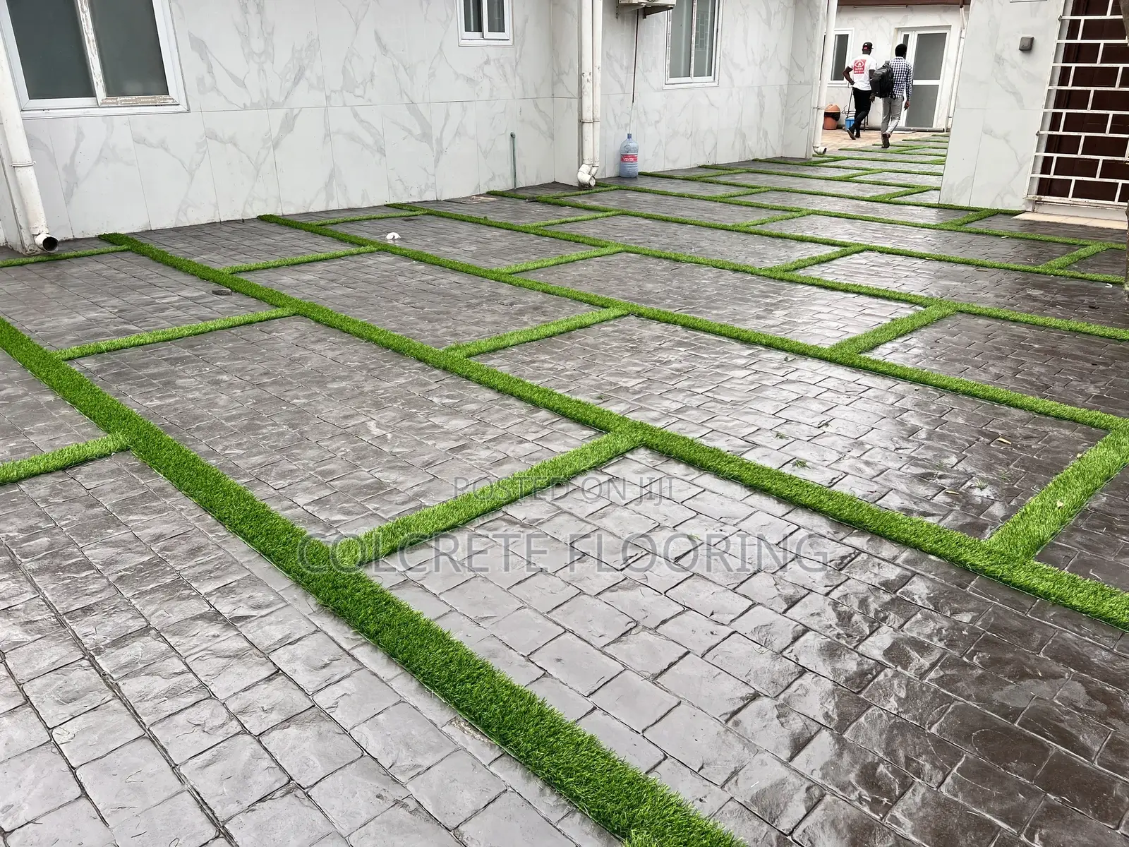 Cobbles Stamped Concrete With Astroturf
