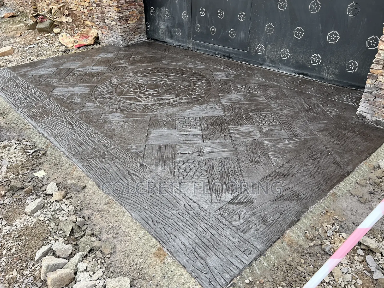 Pebble Black Patterned Concrete