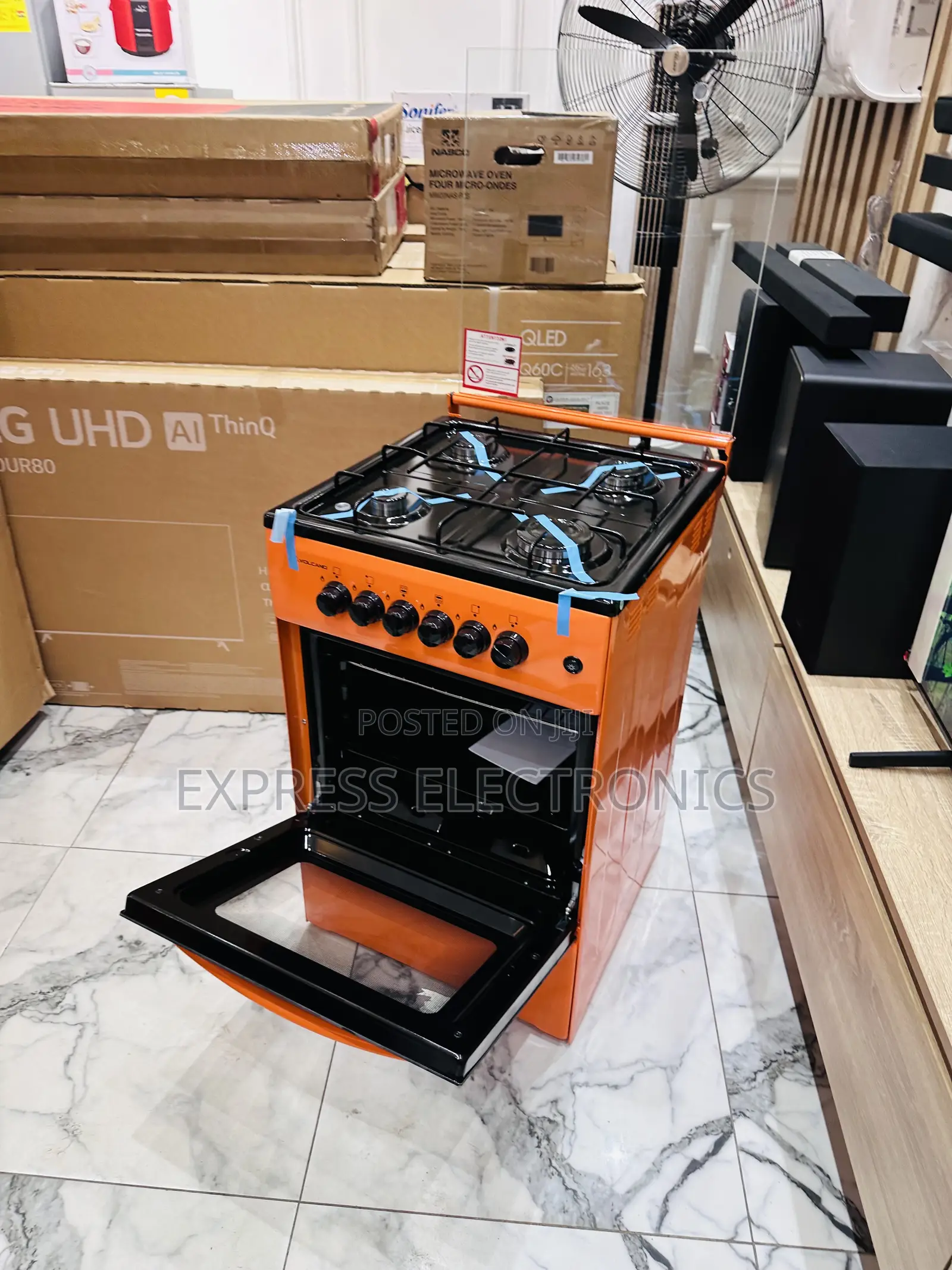 Newly Sealed Gas Orange 4burner 50/50 Volcano Oven.