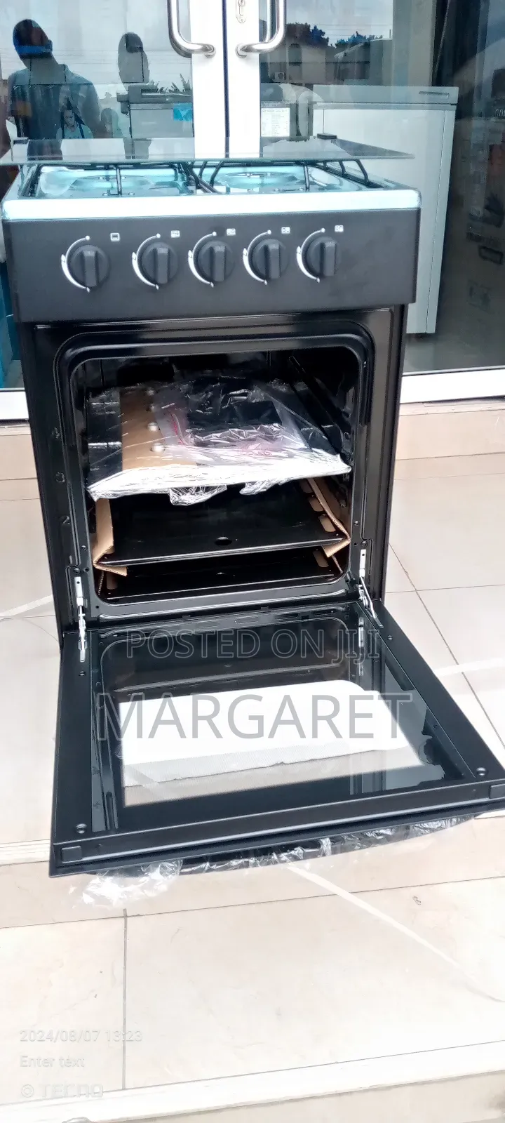 True Midea 4 Burners Gas Cooker Oven and Grill