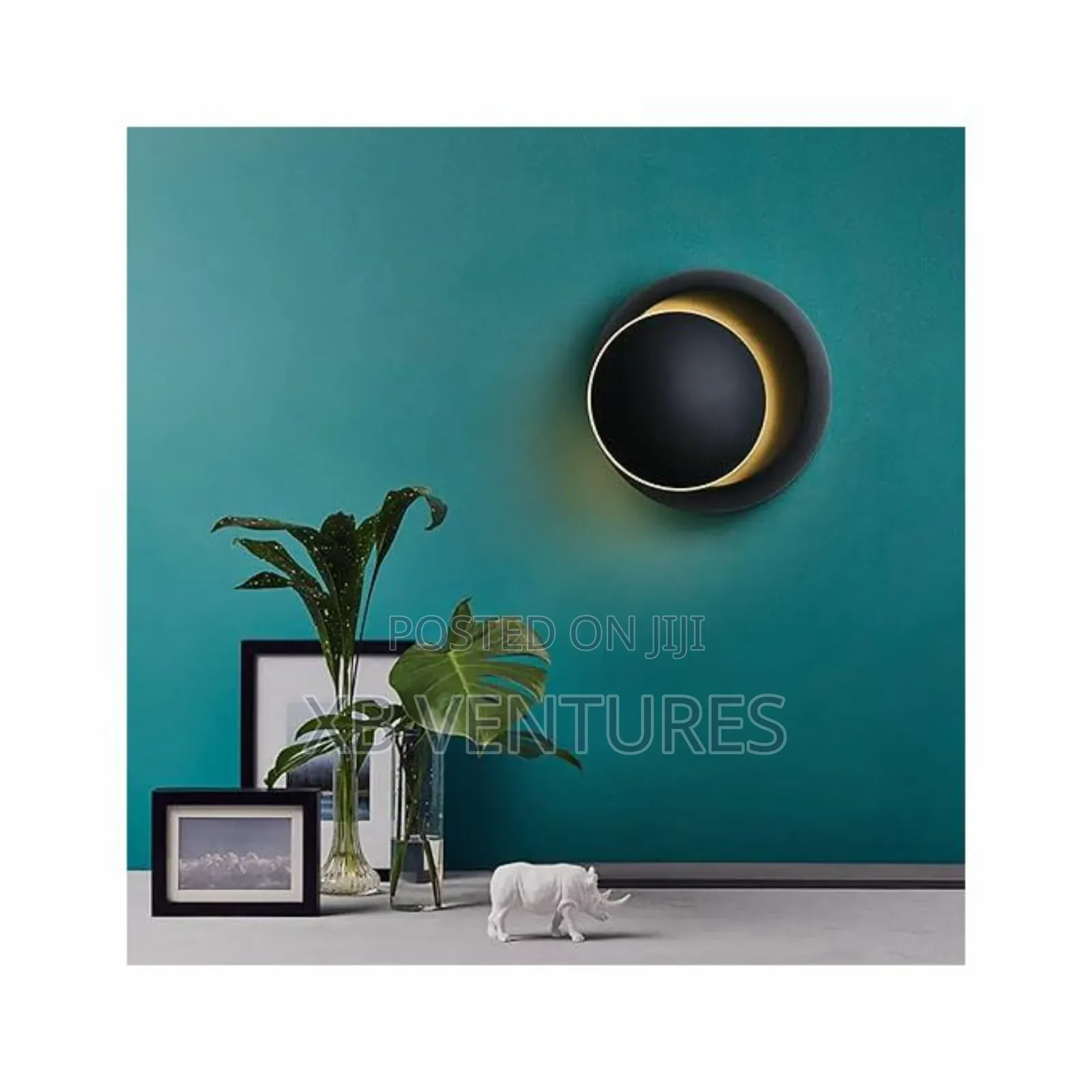 Rotating Eclipse Wall Light