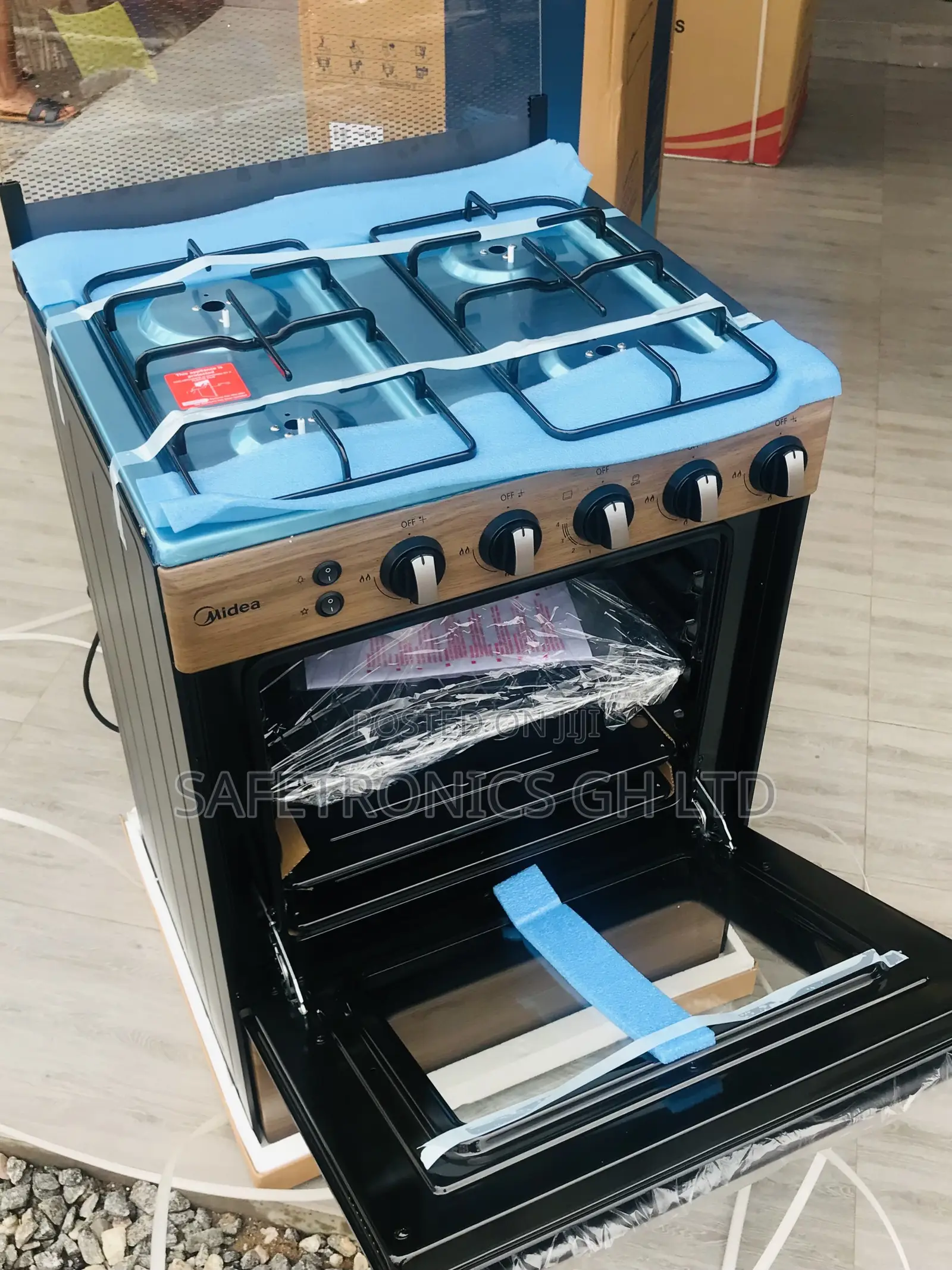 4 Gas Wooden Burner Oven/Grill 60by60 Midea