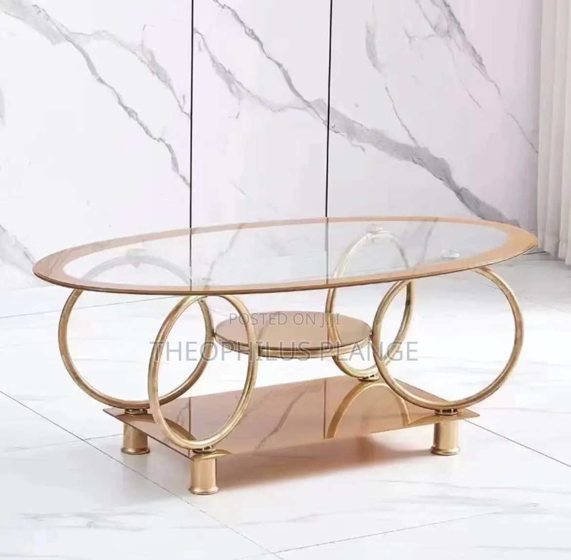 Glass Center Table With Round Base Design.