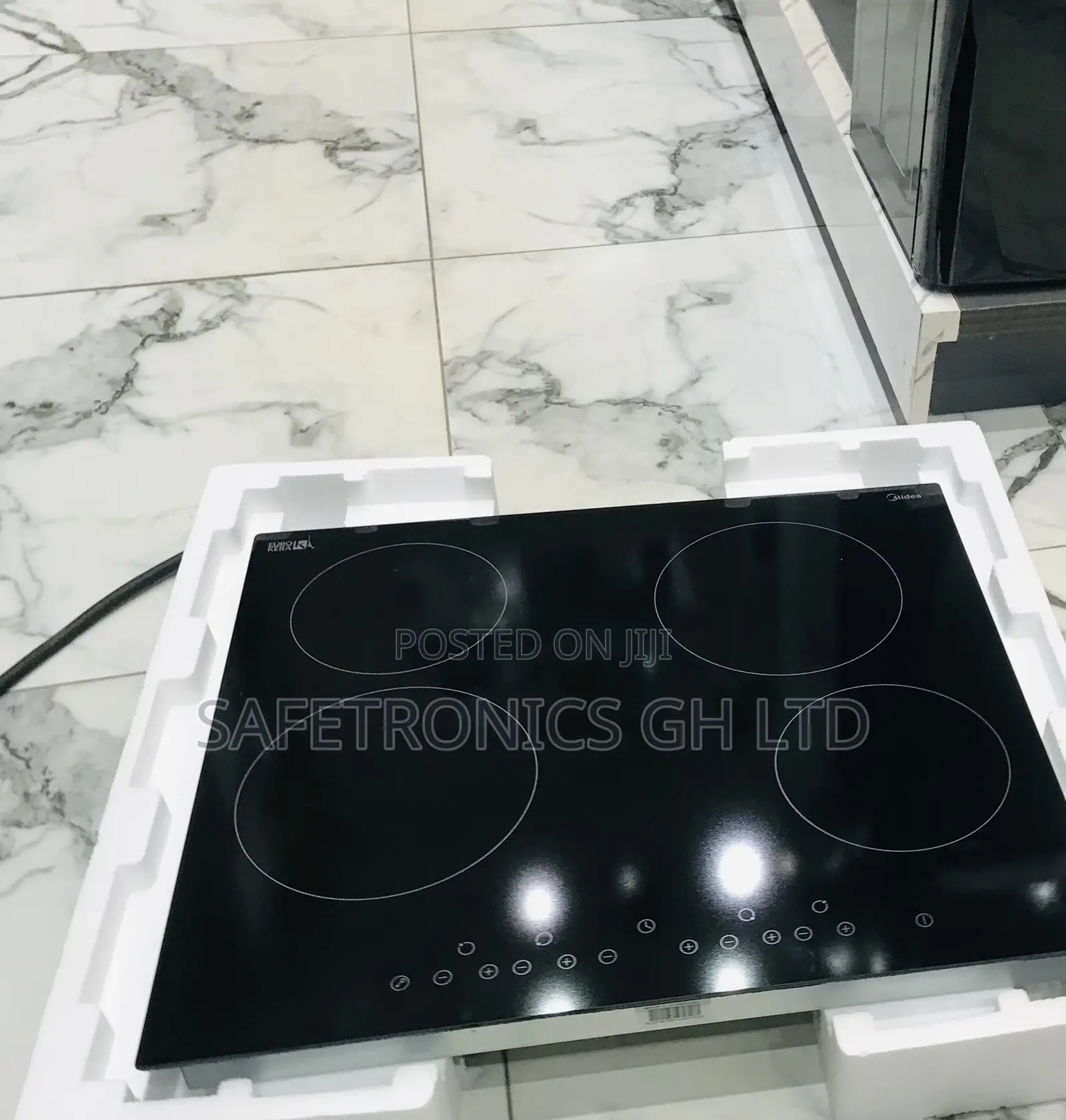 Get Reliable 4 Gas Cooker Midea Black Glass