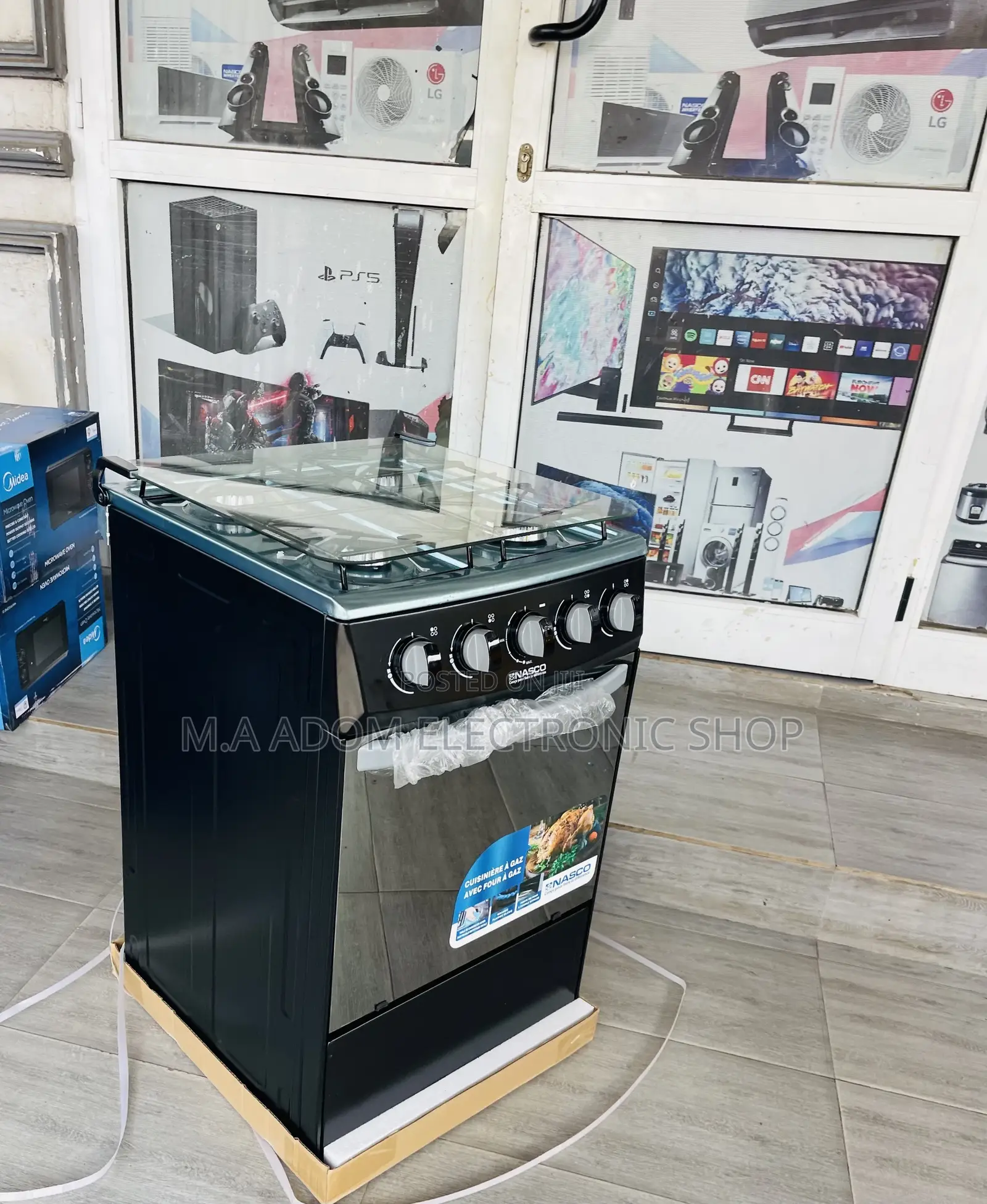 Sealed in Box Nasco 4 Gas Burner With Oven(Black) 