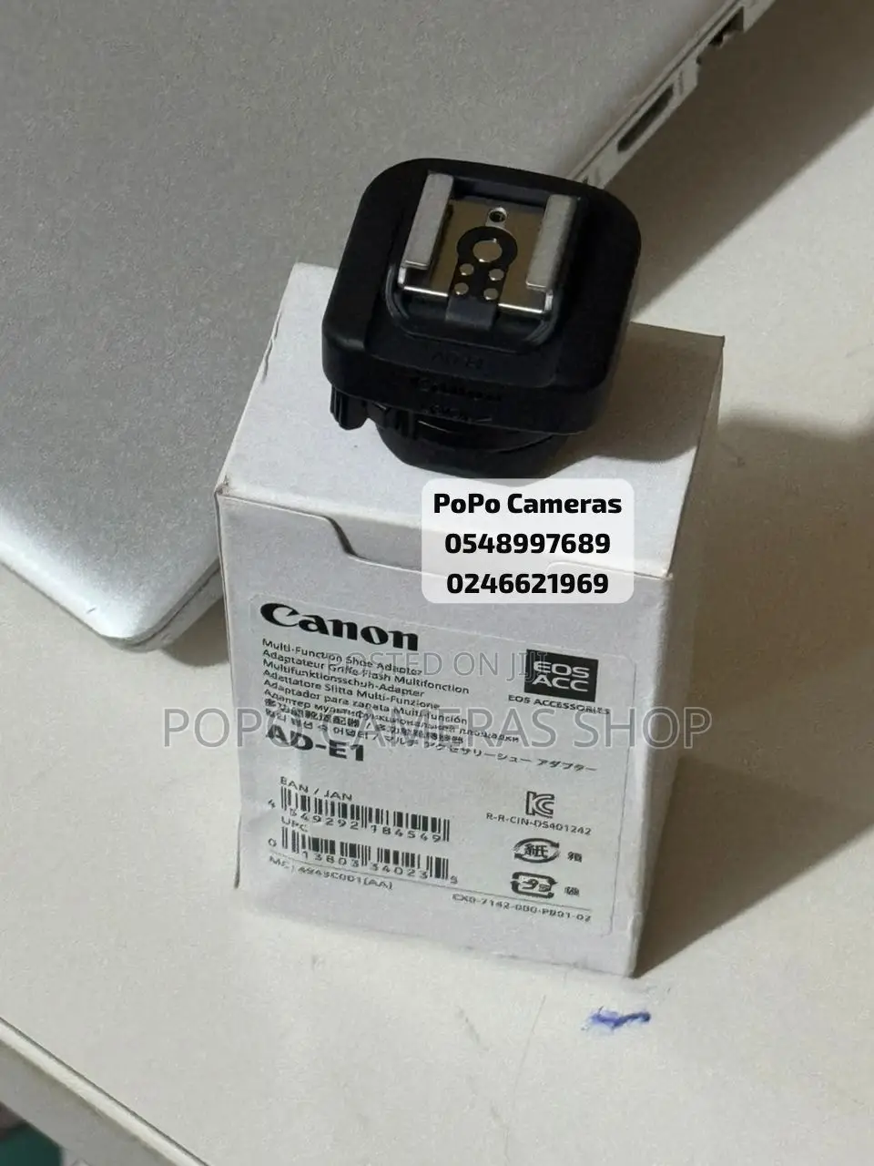 Canon Ad-E1 ( Speedlight Converter for Canon R50)