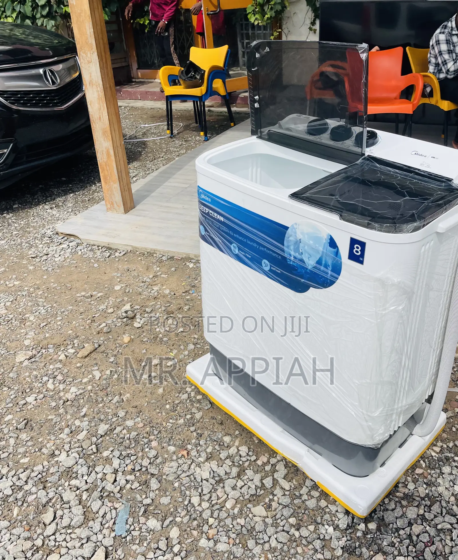 Quiet and Efficient Midea 8kg Top Load Washing Machine.
