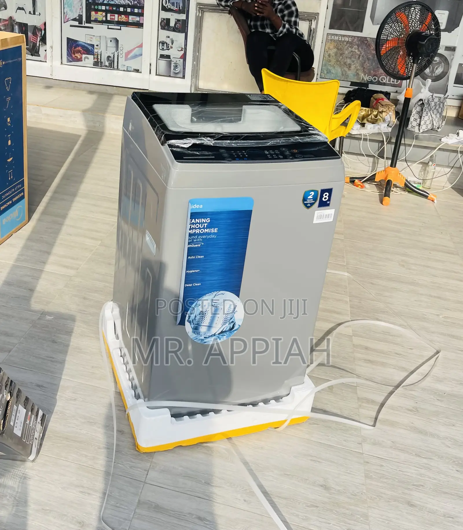 Quiet and Efficient Midea 8kg Top Load Washing Machine.