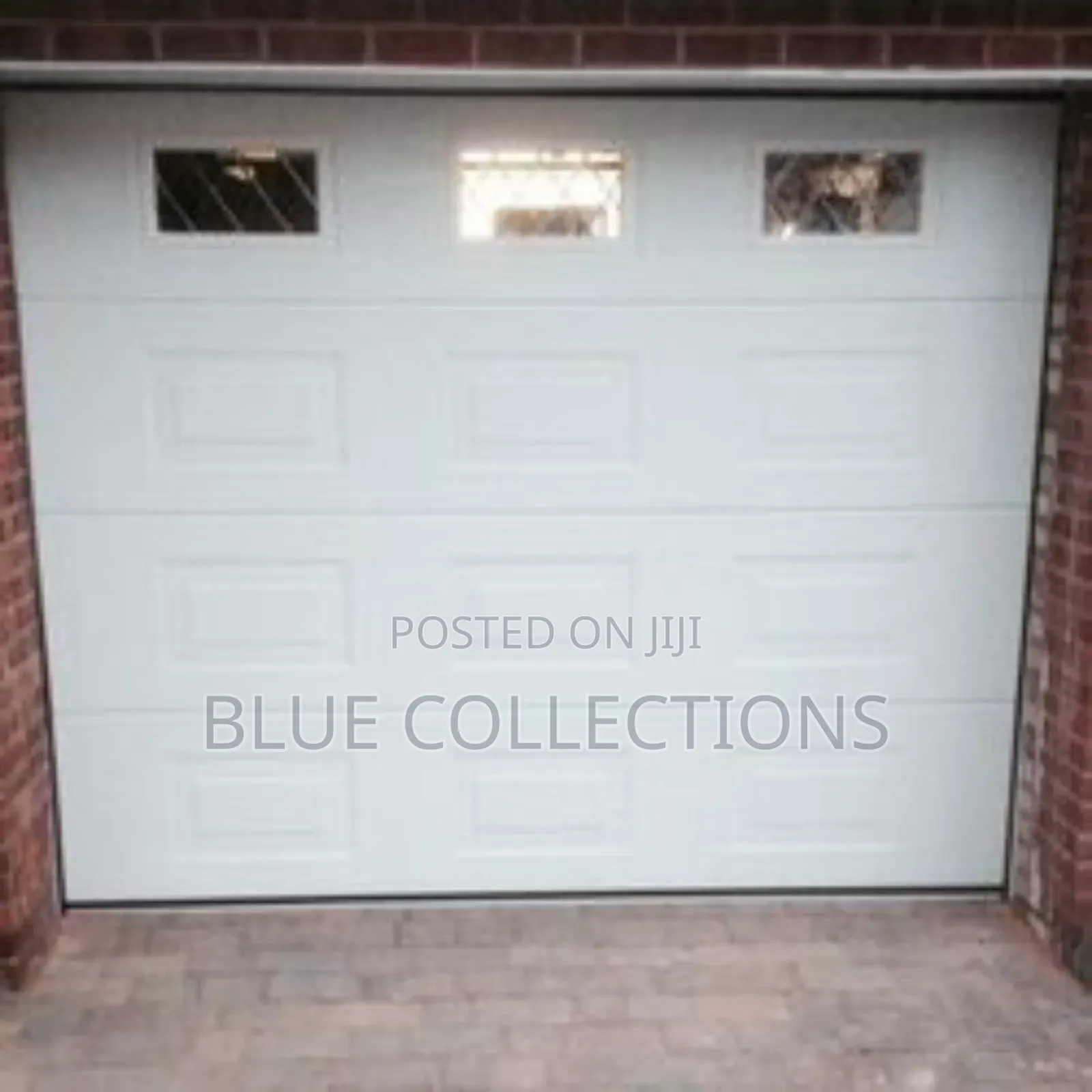 Stylish Automated Garage Door With Fanlight