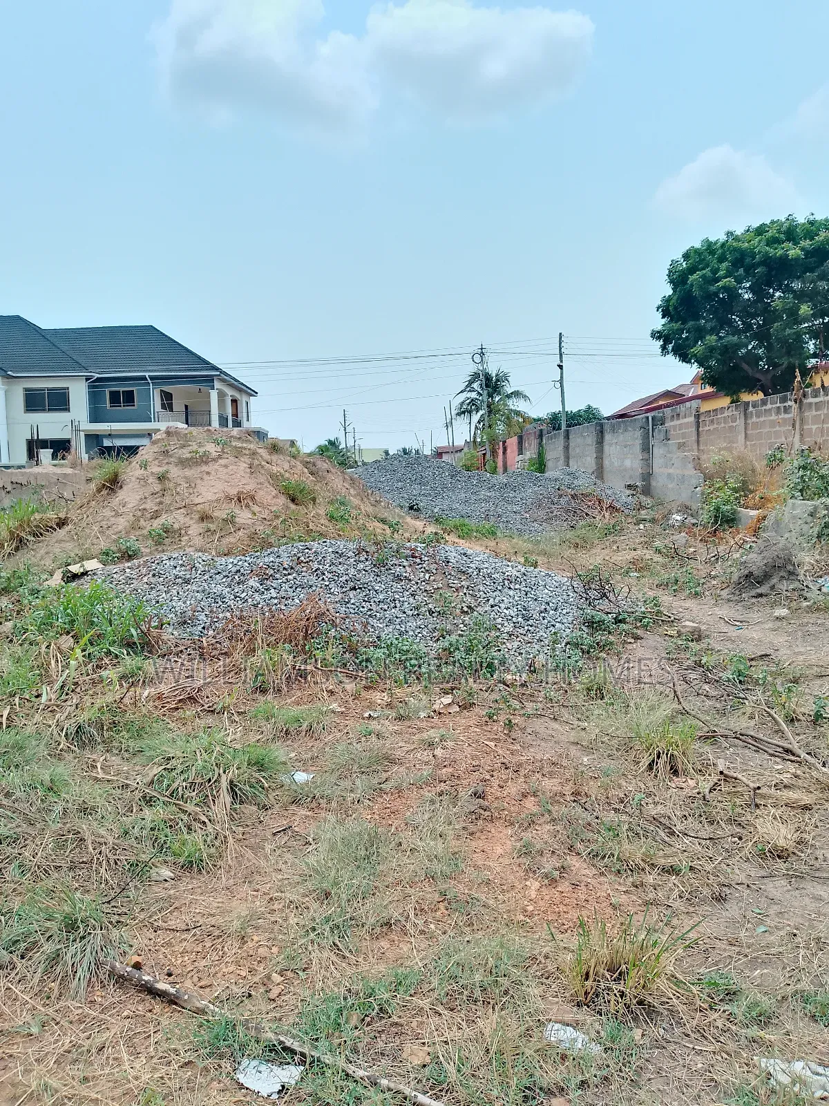 TDC Walled 60 by 140ft Half Plot of Land 4sale,Spintex