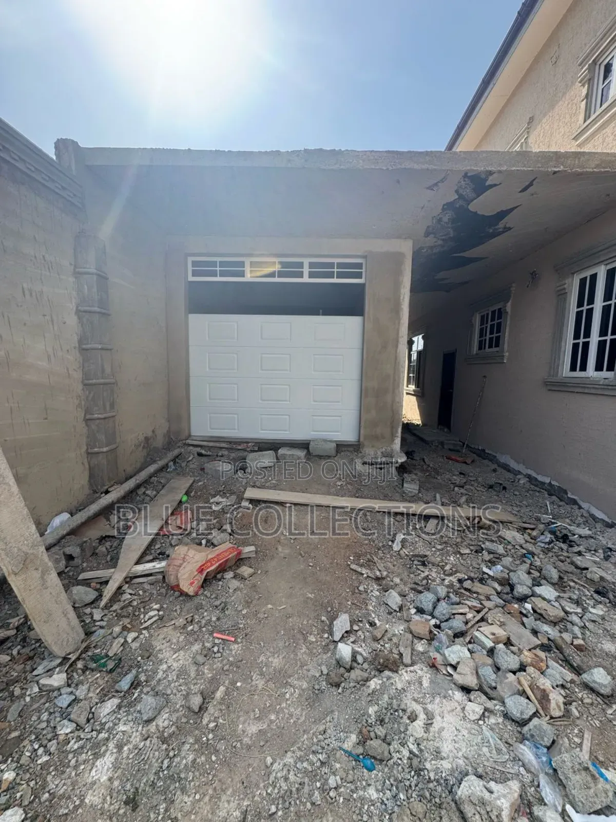 Automated Garage Door With Fanlight and Remote
