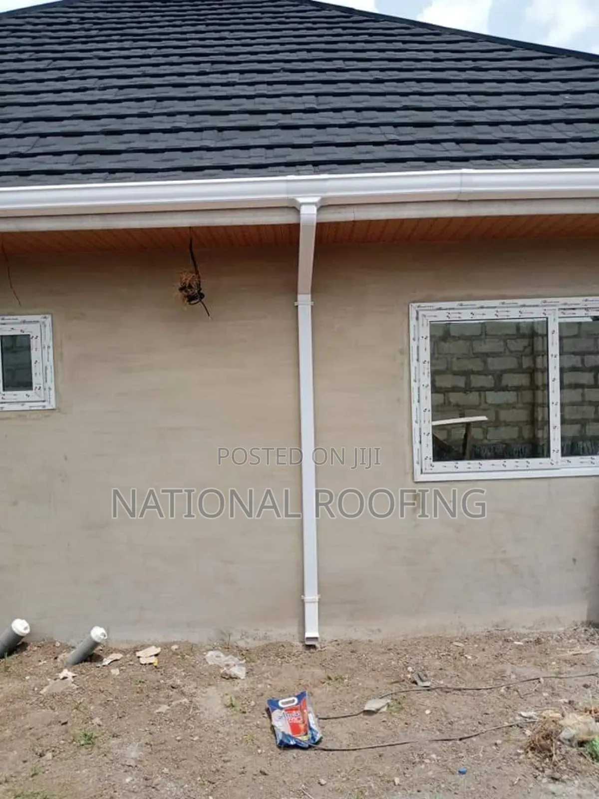 White PVC Rain Gutter and Downpipe