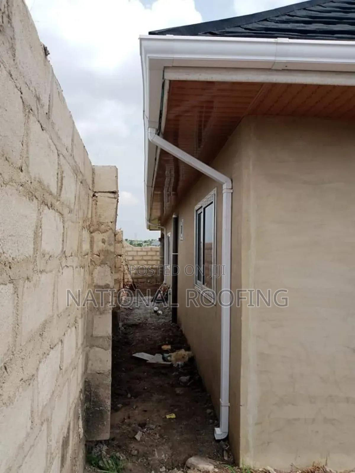 White PVC Rain Gutter and Downpipe