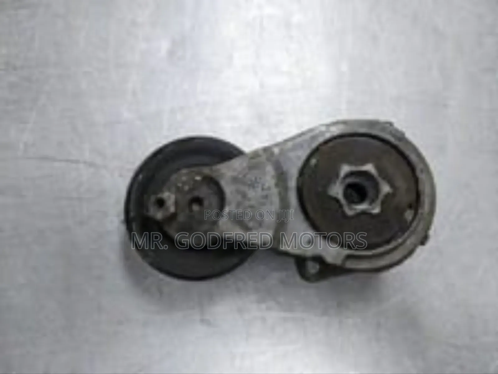 Nissan Sentra 2007-12 Belt Tensioner (Adjuster). Original.
