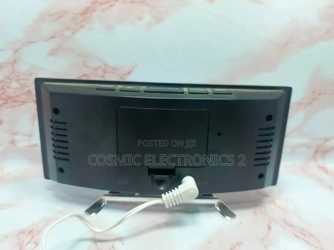 Curved Mirror Alarm Clock