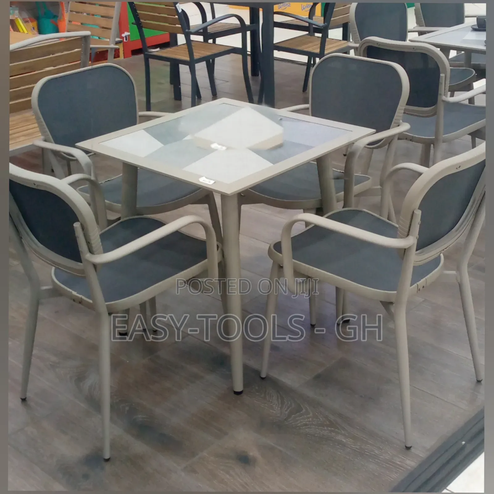 Outdoor Dining Set Chairs and a Metal Square Table