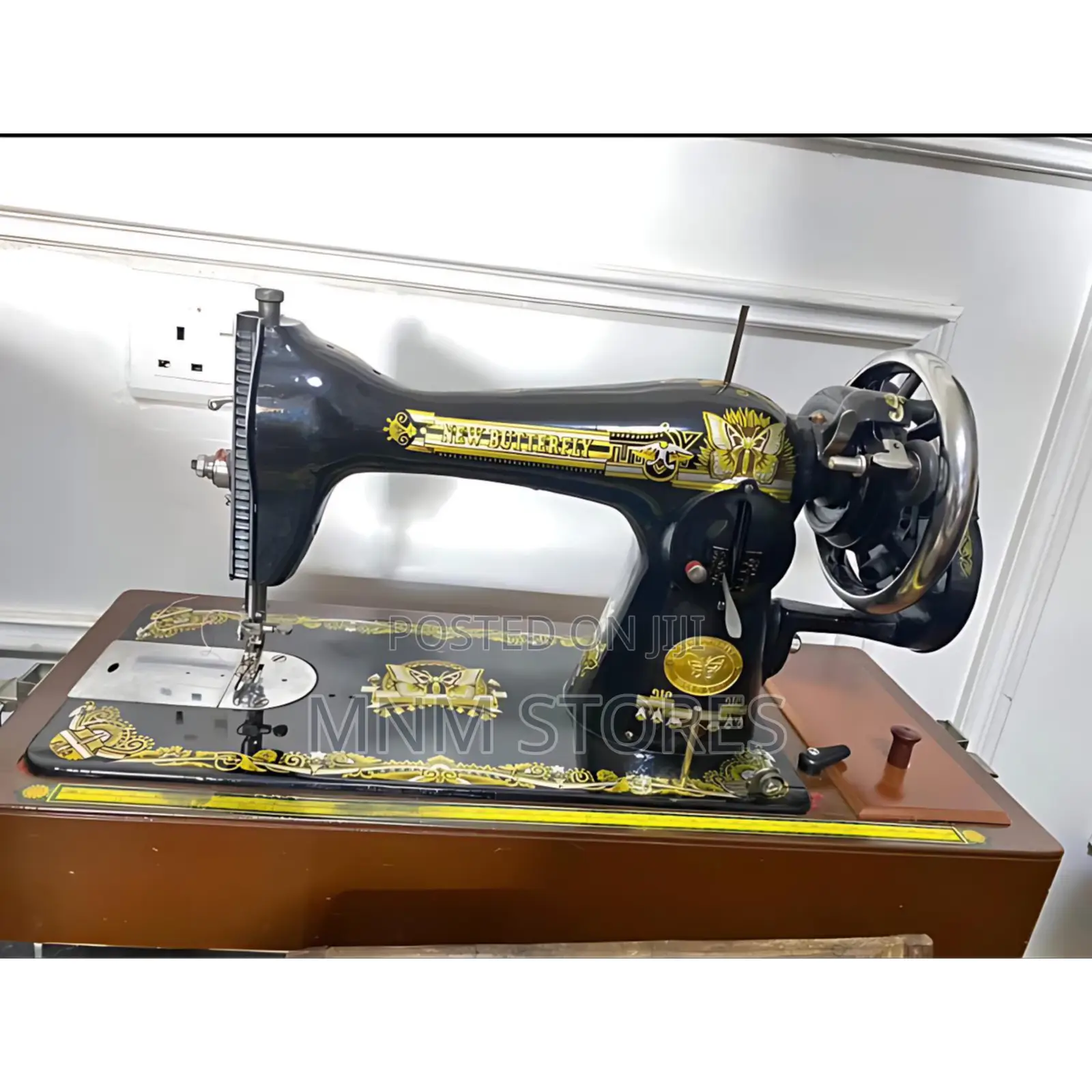 Old Butterfly Sewing Machine