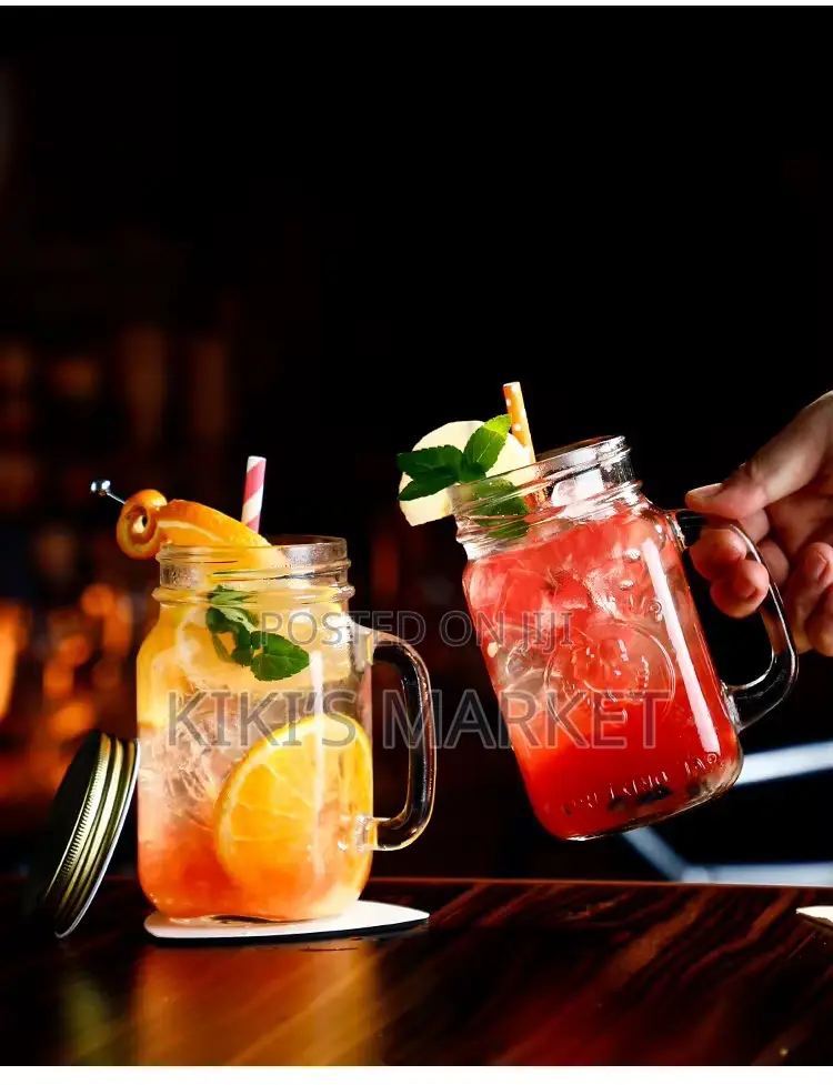 Mason Jar With Colored Lida and Straw