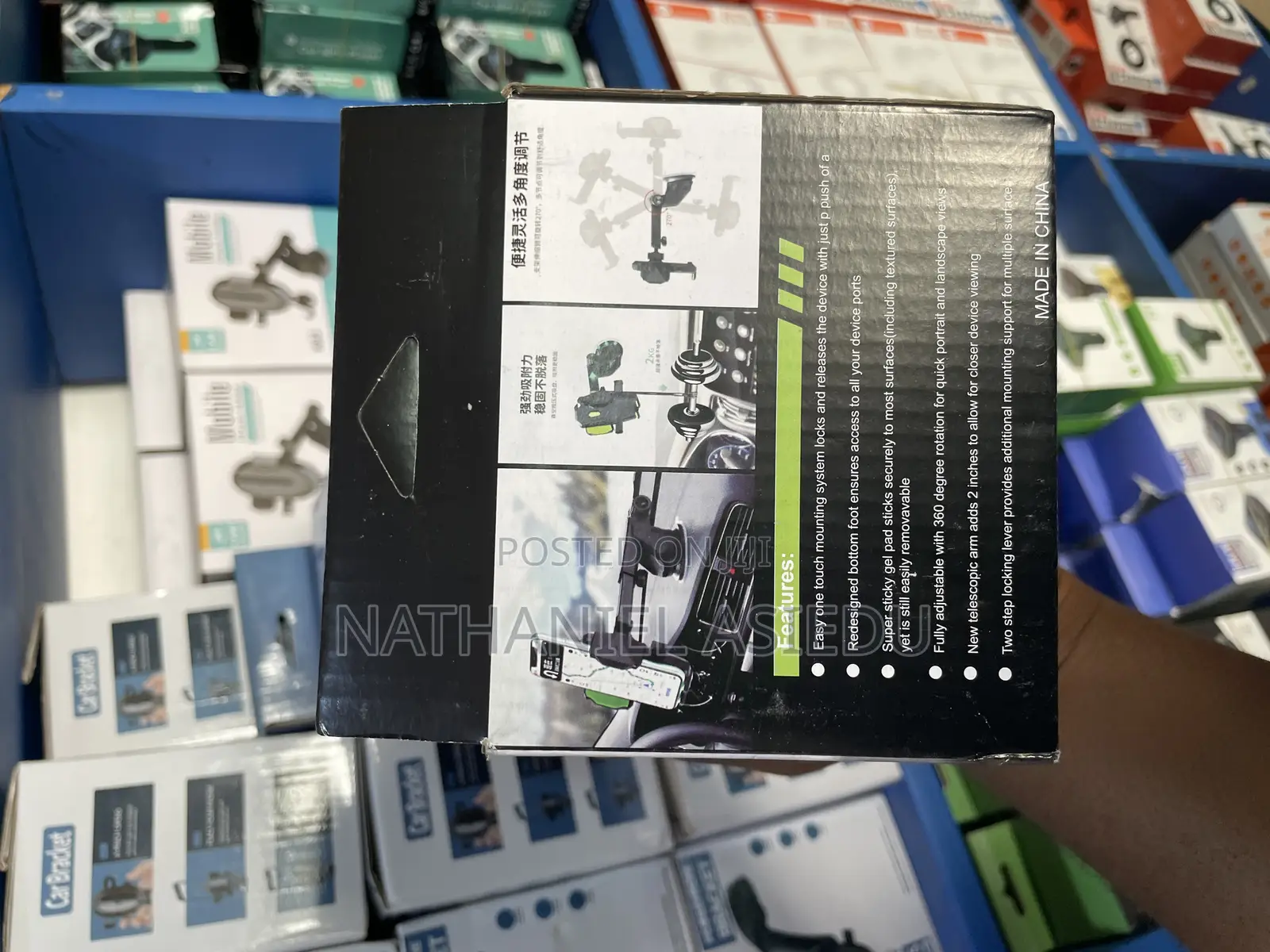 Mobile Phone Holder, Likely Designed for Use in a Car as a Mount.