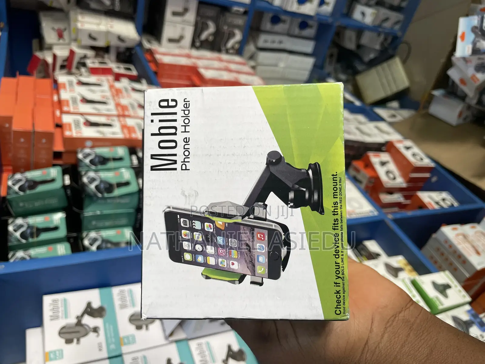 Mobile Phone Holder, Likely Designed for Use in a Car as a Mount.