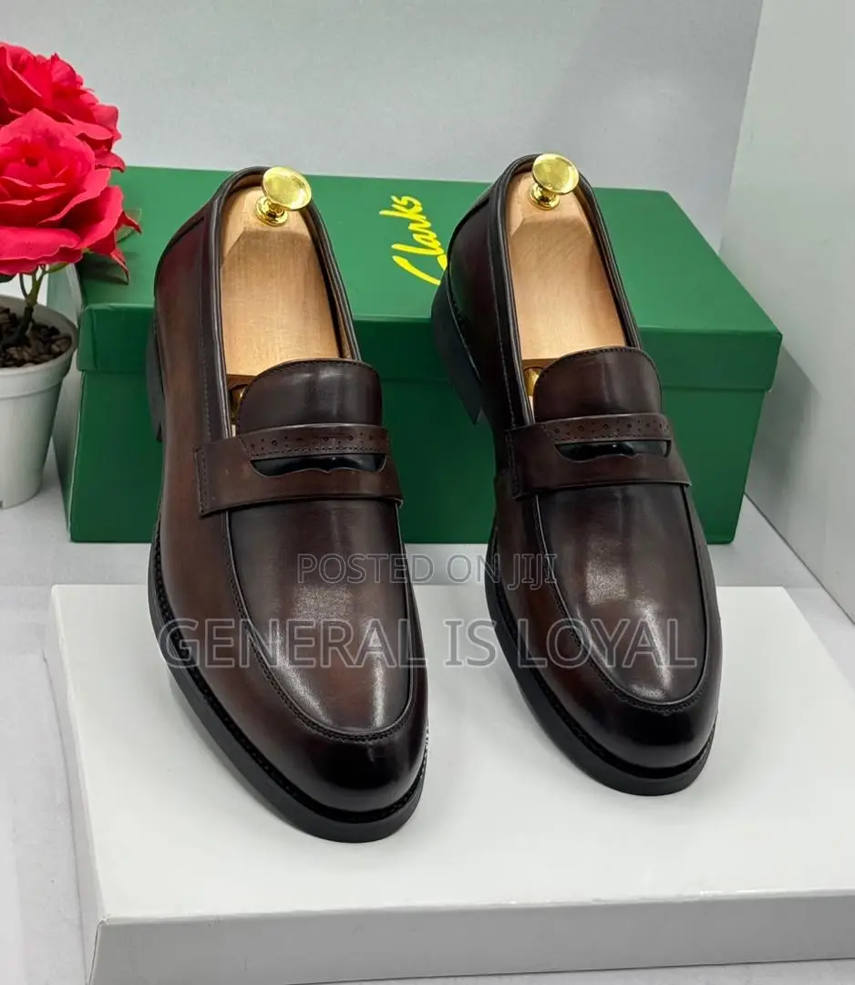 Clarks Men's Brown Leather Penny Loafers.