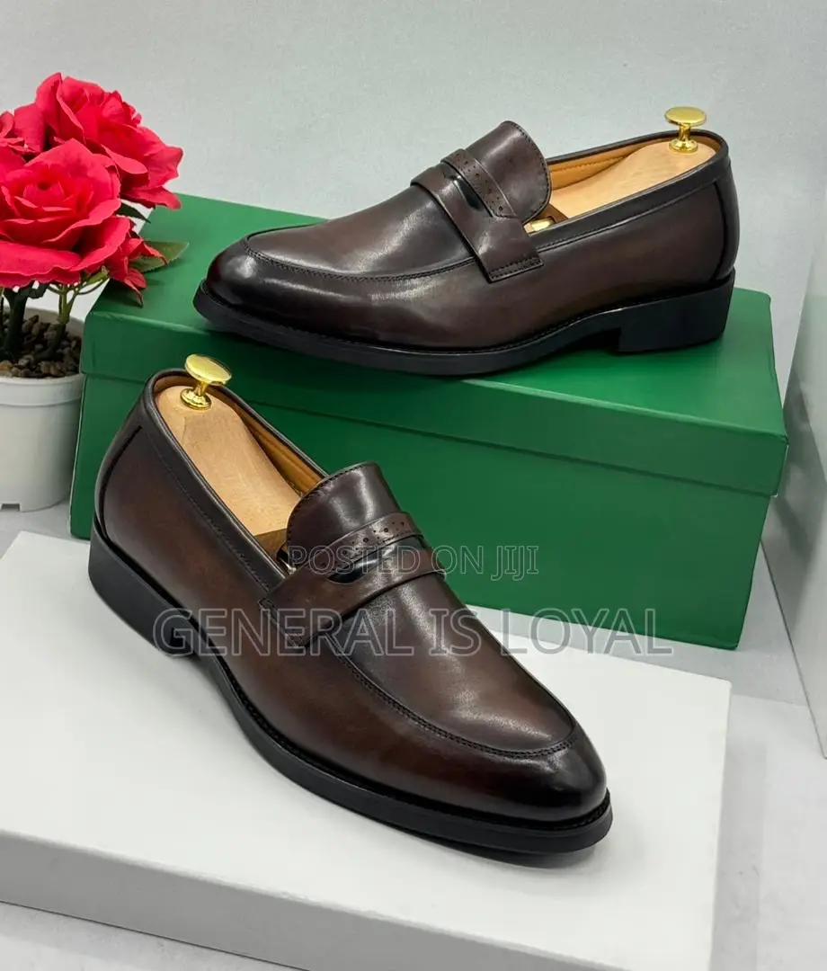 Clarks Men's Brown Leather Penny Loafers.