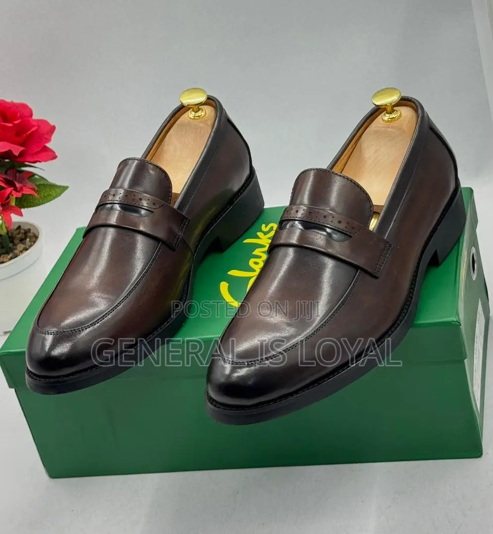 Clarks Men's Brown Leather Penny Loafers.