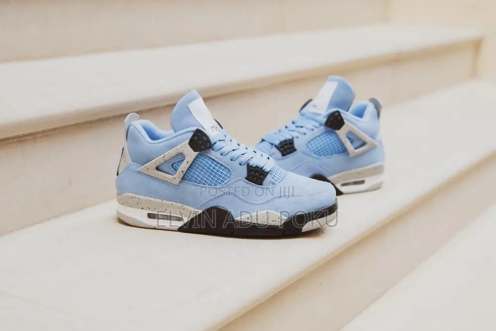 Air Jordan 4 Retro “ University Blue “ Sneakers