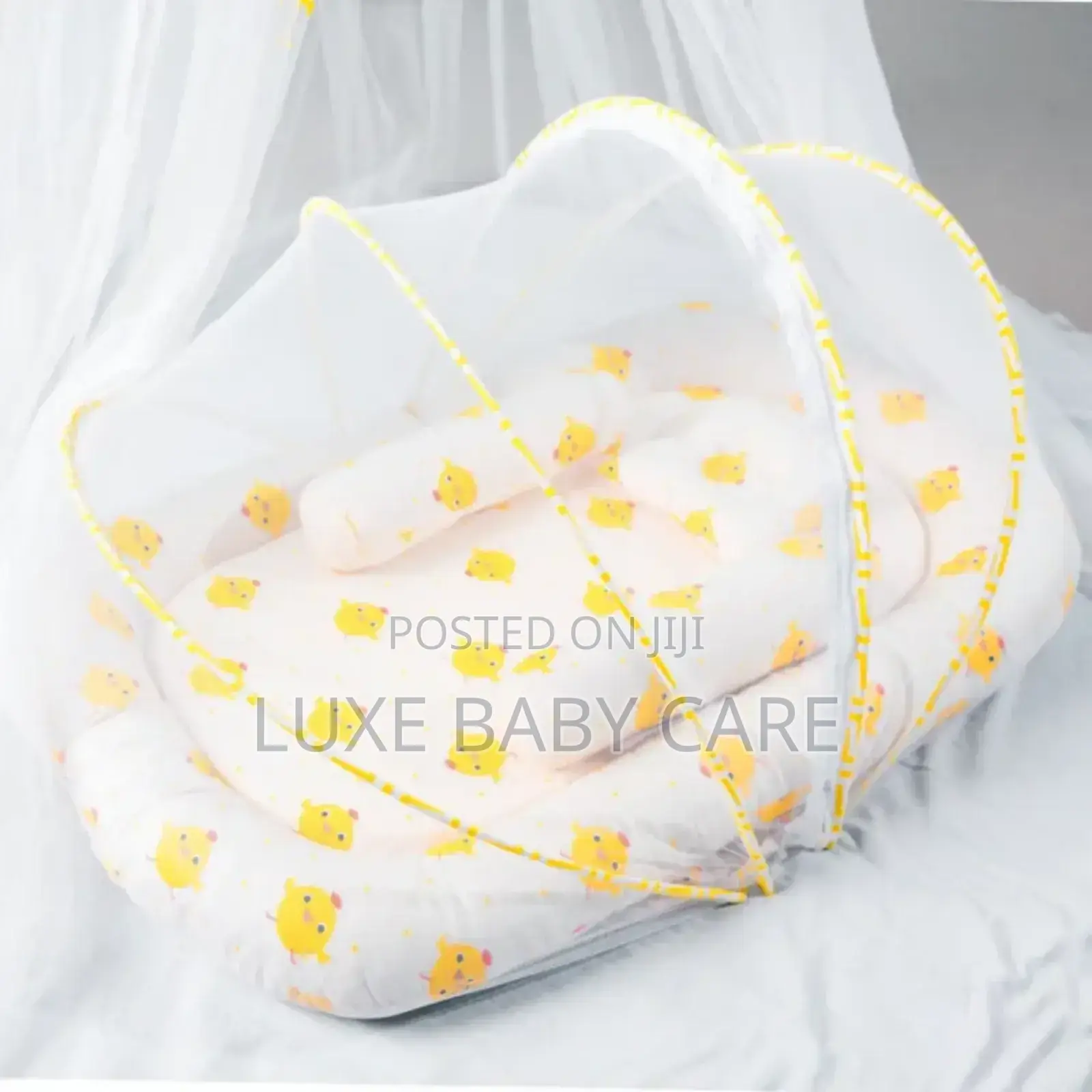 Portable Baby Bed With an Integrated Mosquito Net.