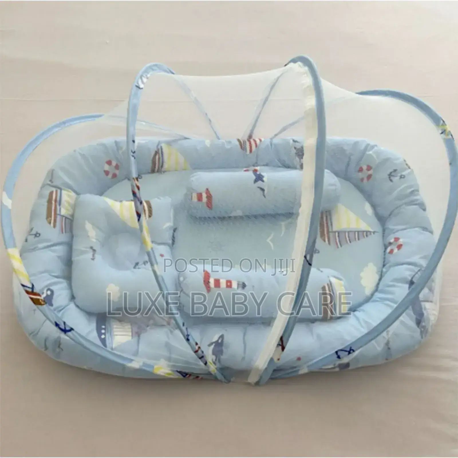 Portable Baby Bed With an Integrated Mosquito Net.