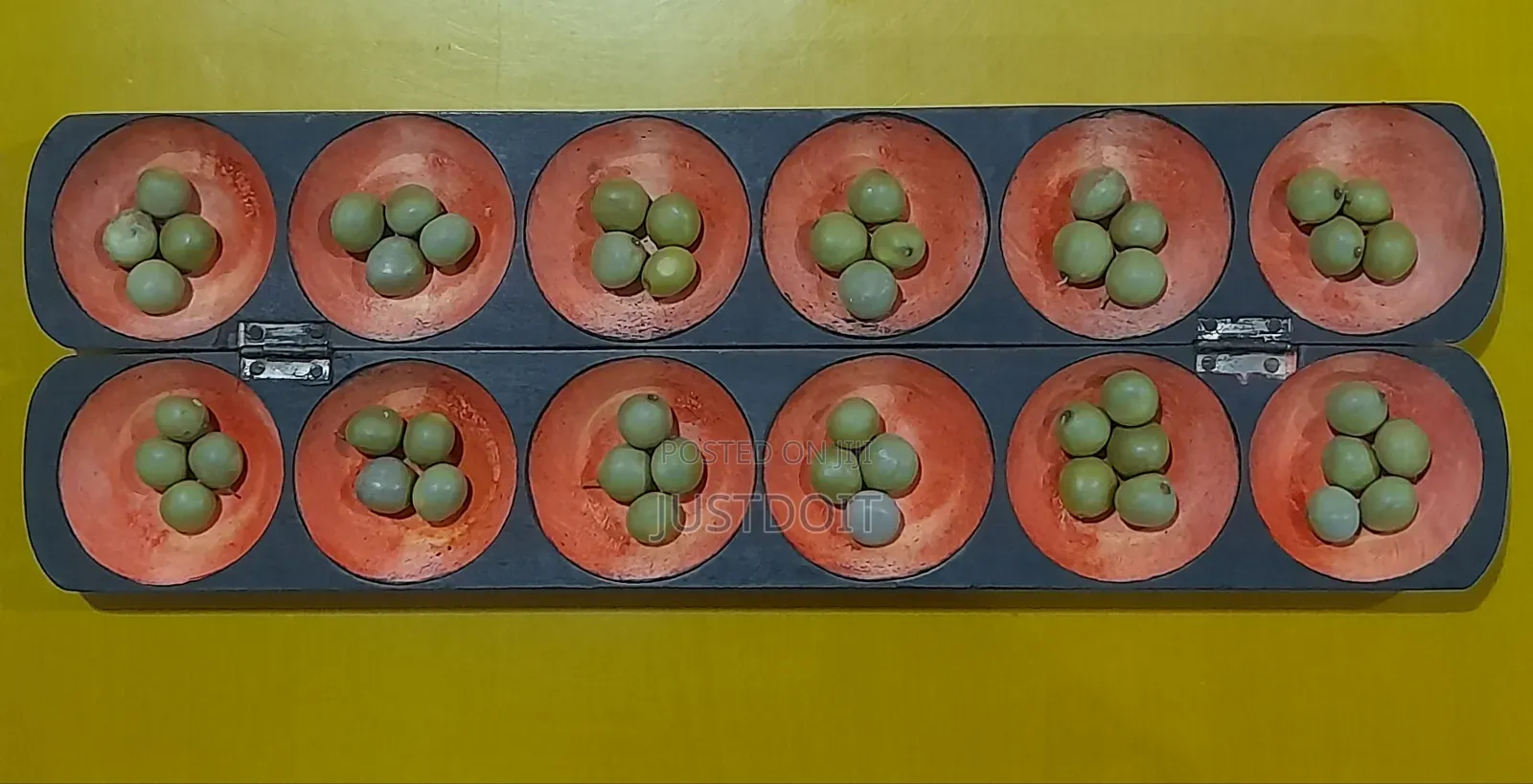 Oware With 50 Pebbles