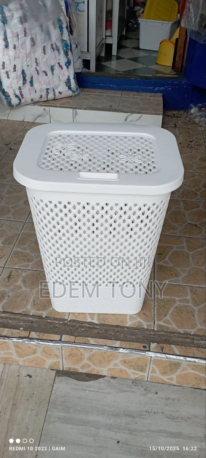 White Plastic Laundry Basket With a Lid
