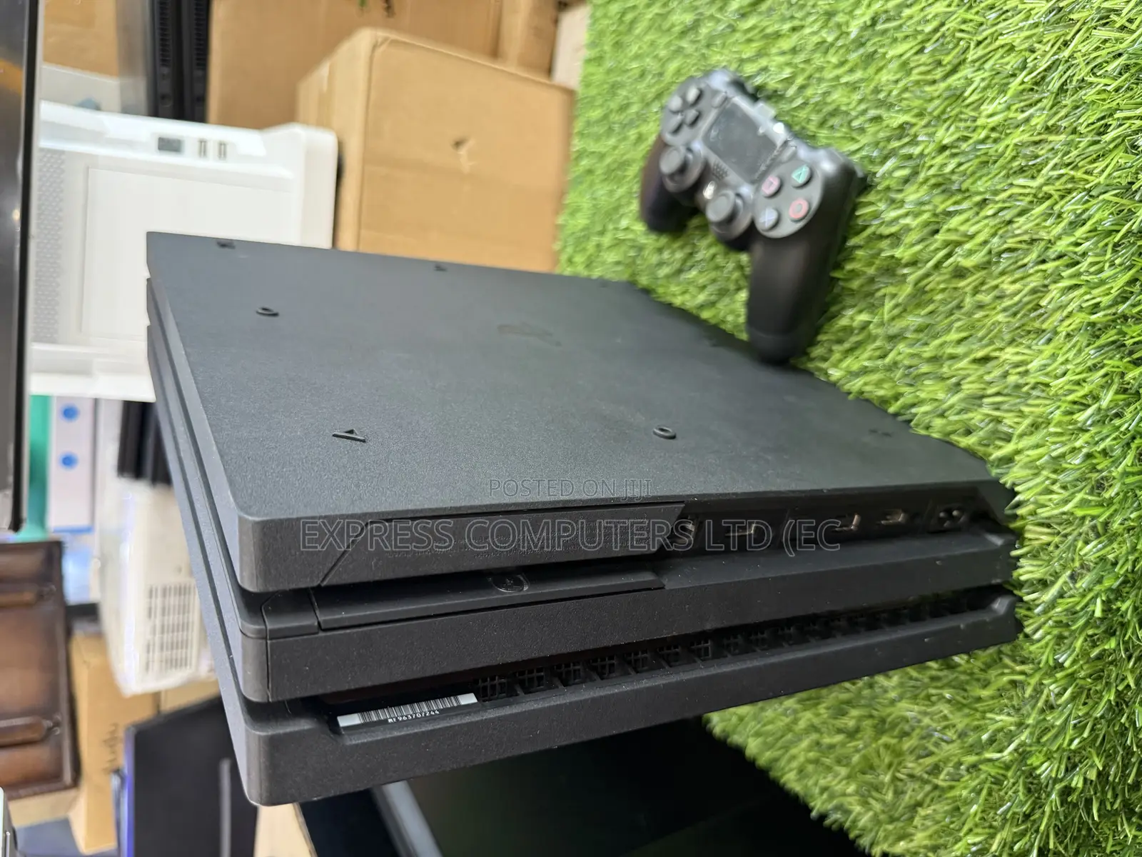 Playstation 4 Pro Console Display With One Controller and One Cd