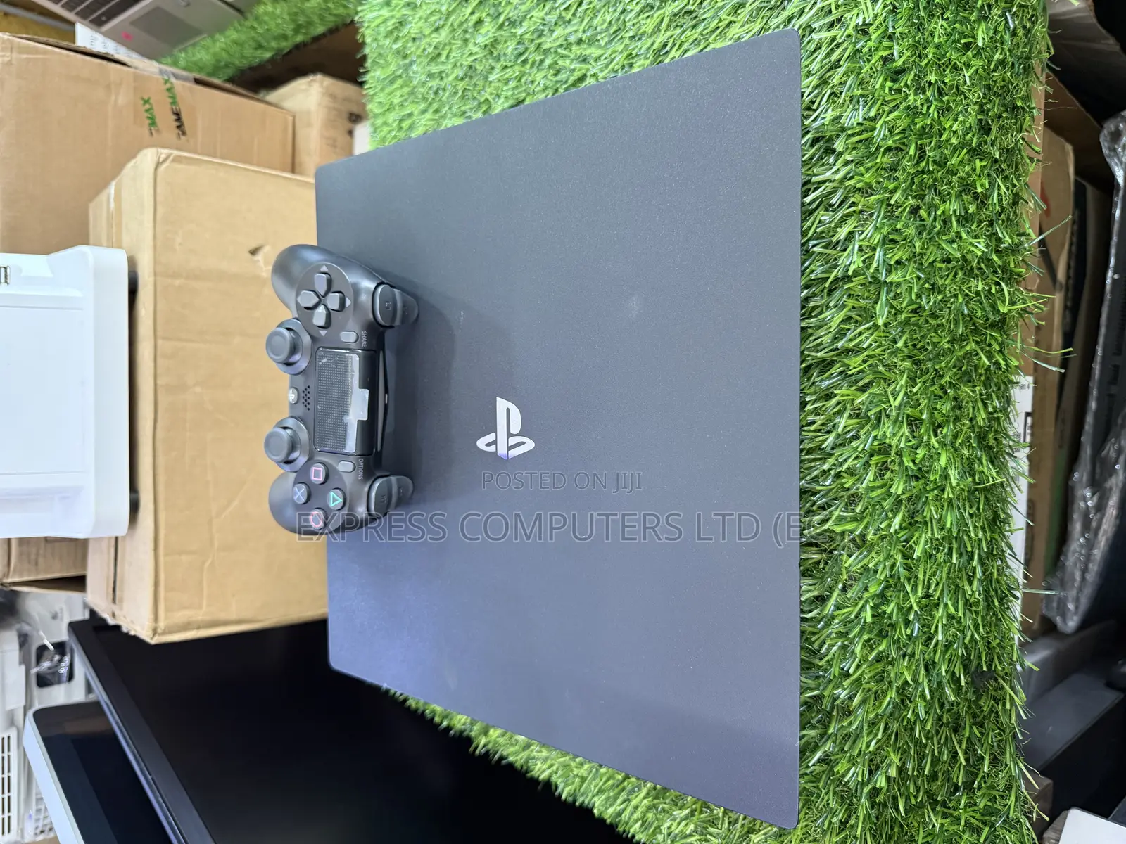 Playstation 4 Pro Console Display With One Controller and One Cd