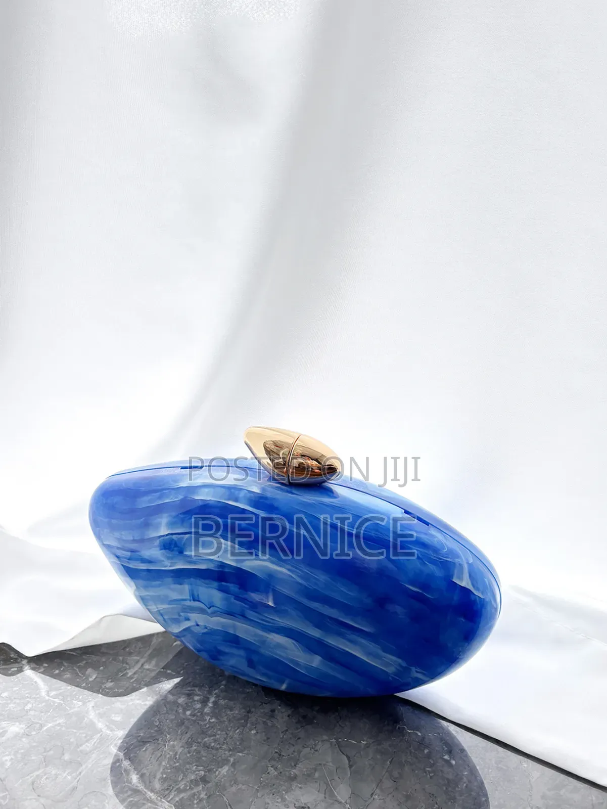 Elegant Blue Oval Clutch Bag – Stylish Unique Acryclic Design
