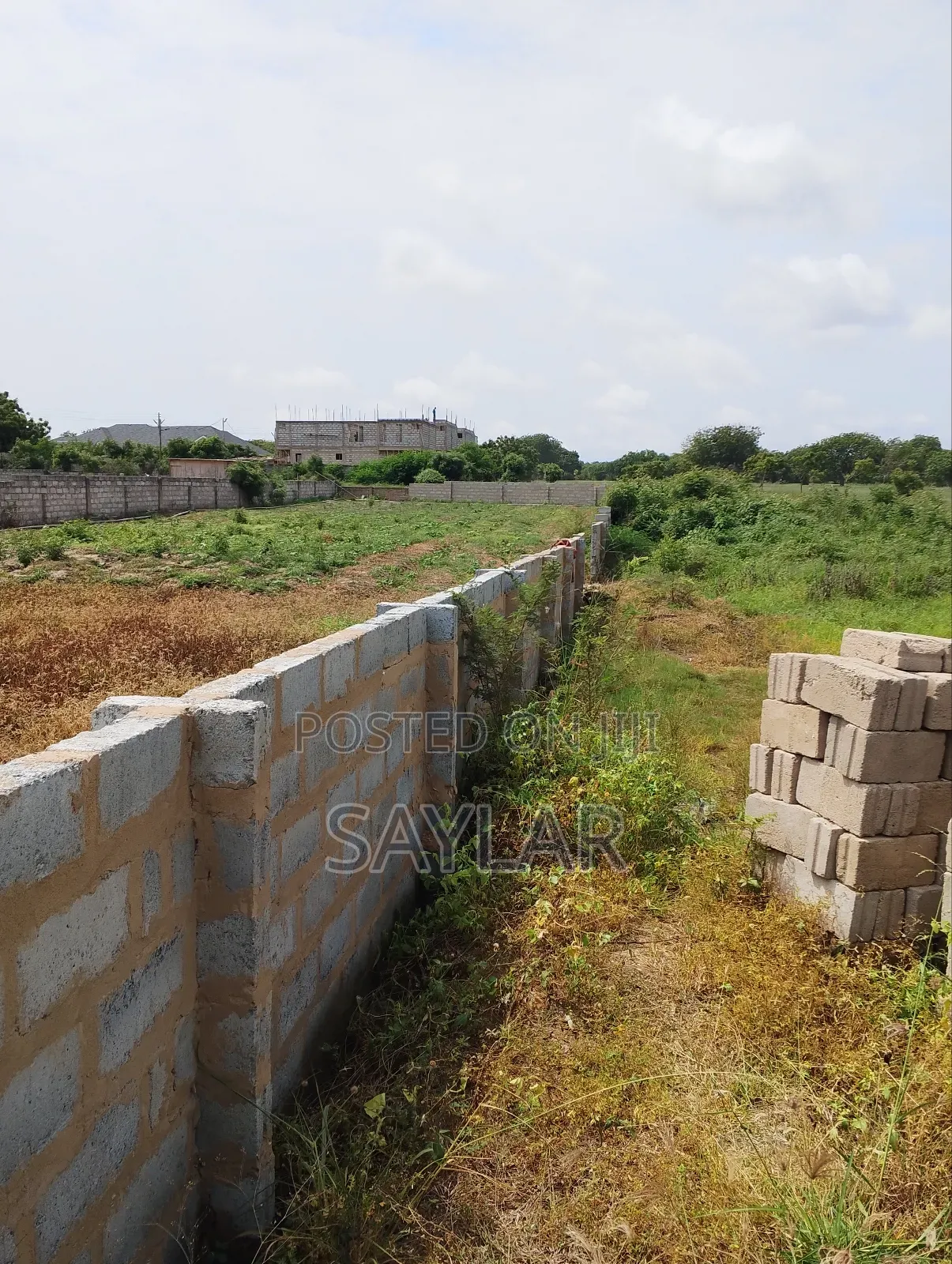 A Half Plot Fully Fenced at Celebrity Golf Course Area Sakomono