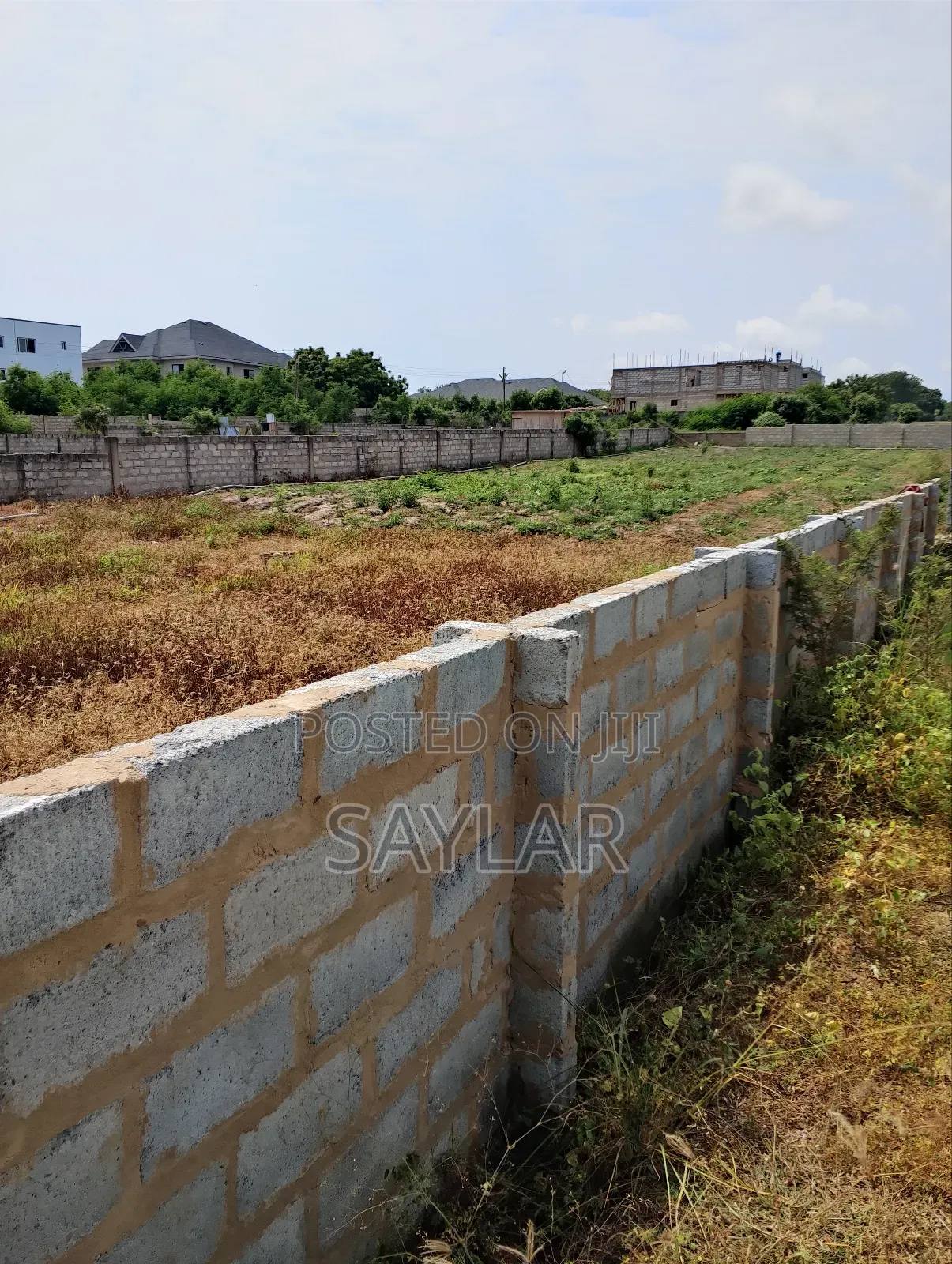 A Half Plot Fully Fenced at Celebrity Golf Course Area Sakomono